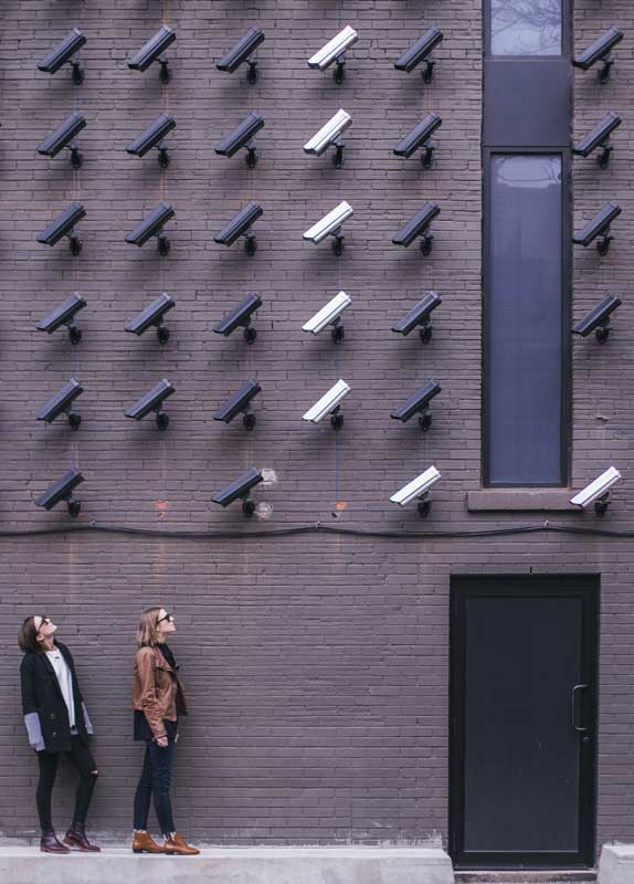 About us, Wall of security cameras for Royal Security Systems